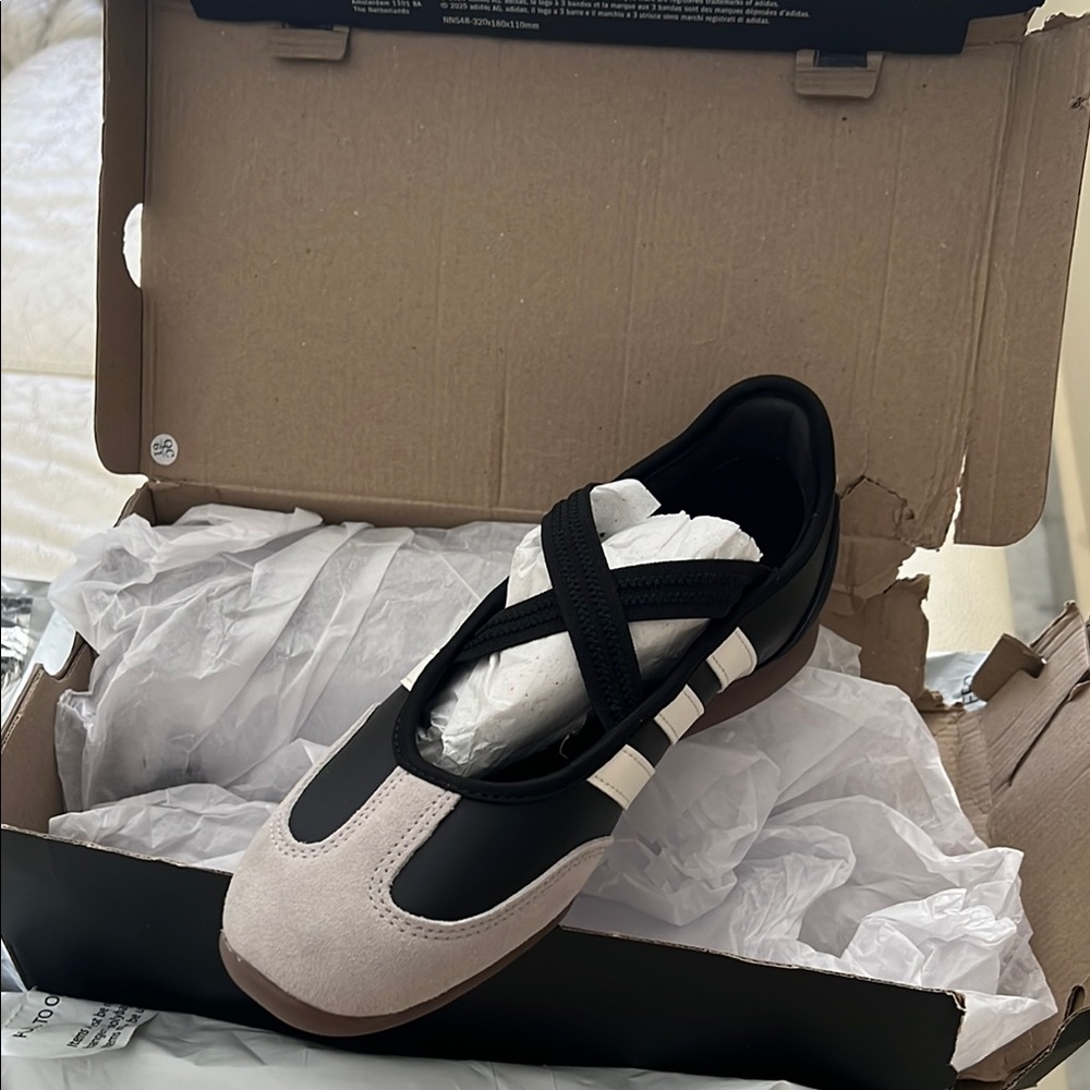 adidas Women’s Black and White Slip-On Sneakers with Crisscross Straps